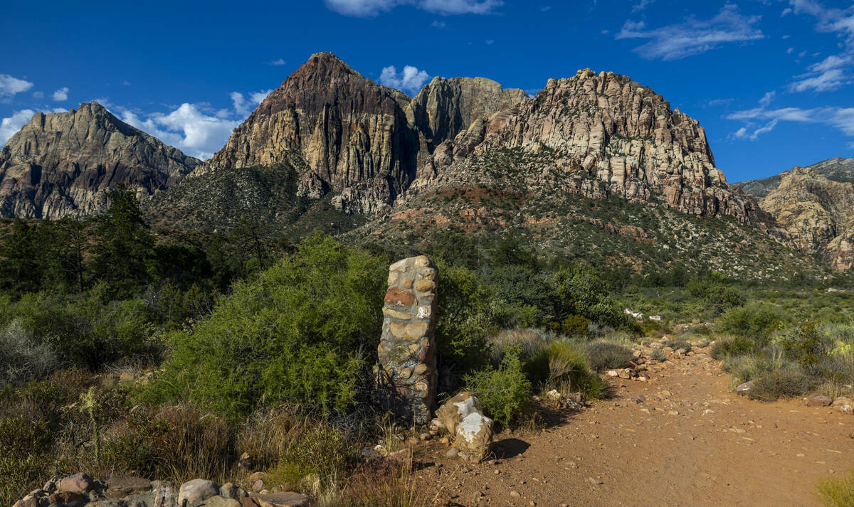 A stone marker along the Pine Creek Trail which holds the former Horace Wilson homestead within ...