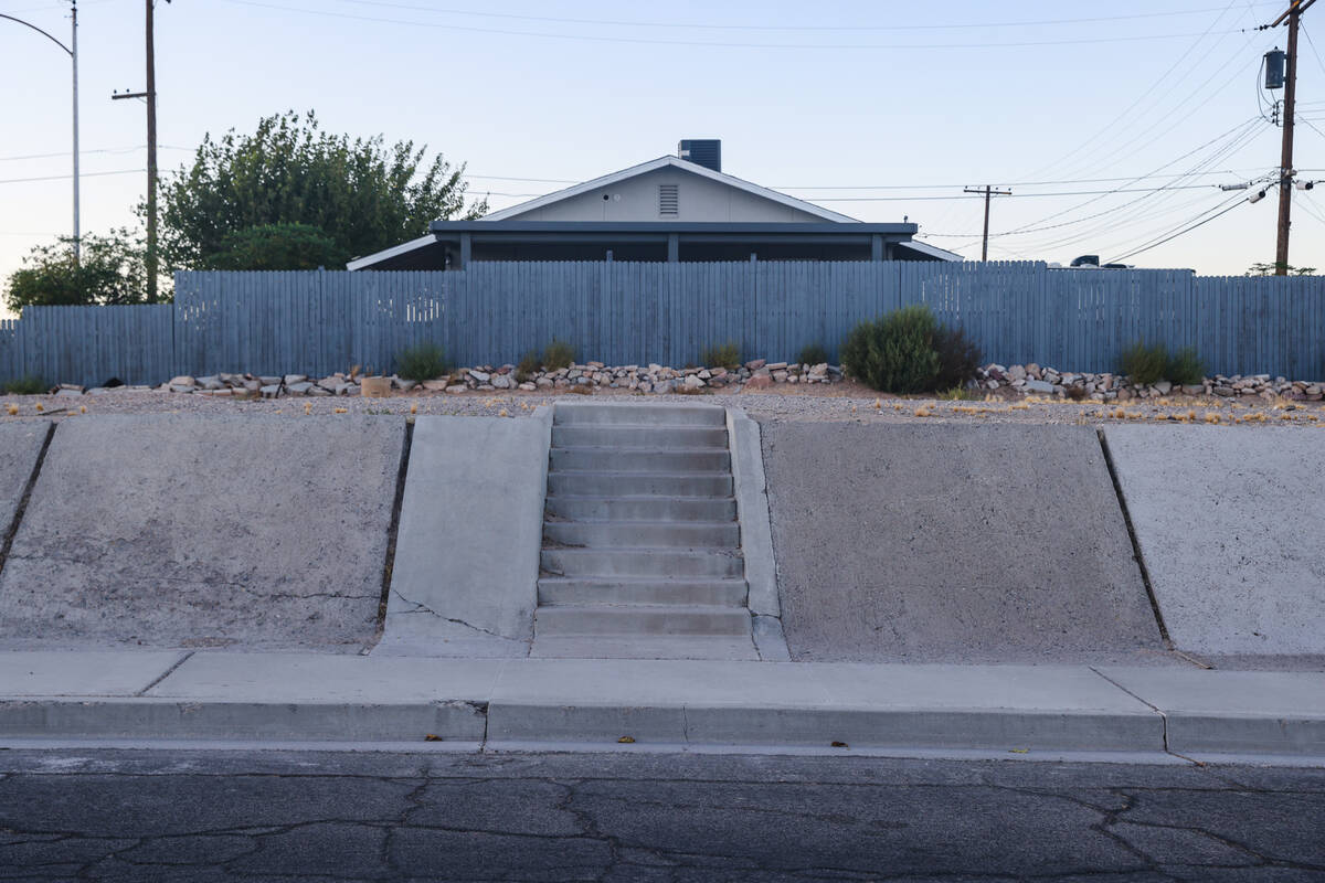 An empty lot where a home once stood in the Windsor Park neighborhood in North Las Vegas, Monda ...