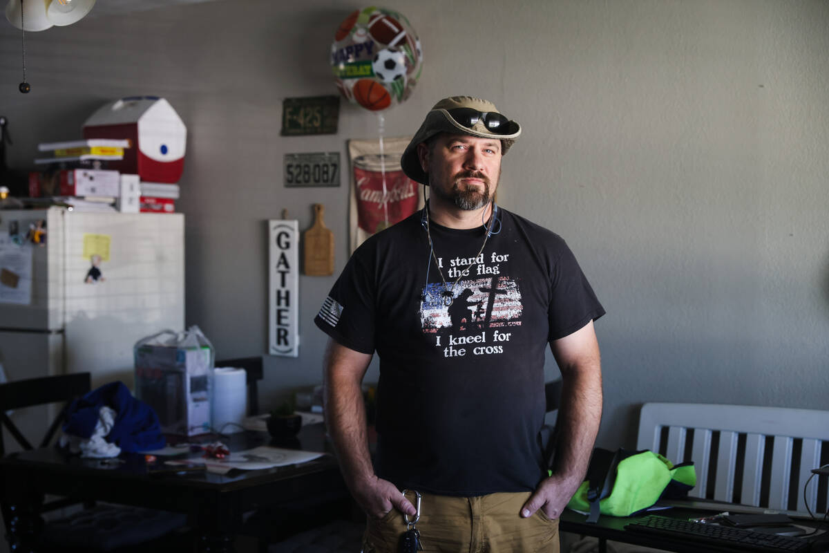 Local resident Jason Smith poses for a portrait in his home in the Windsor Park neighborhood in ...