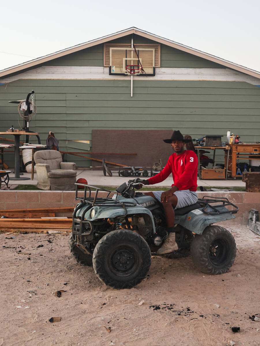 Local resident Burgess Houston III poses for a portrait at his home in the Windsor Park neighbo ...