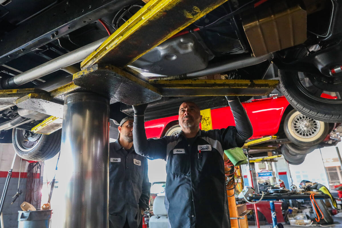 Adam Sardaryan, right, and Jacko Sardaryan work on a car at Pop's Automotive on Monday, Feb. 12 ...