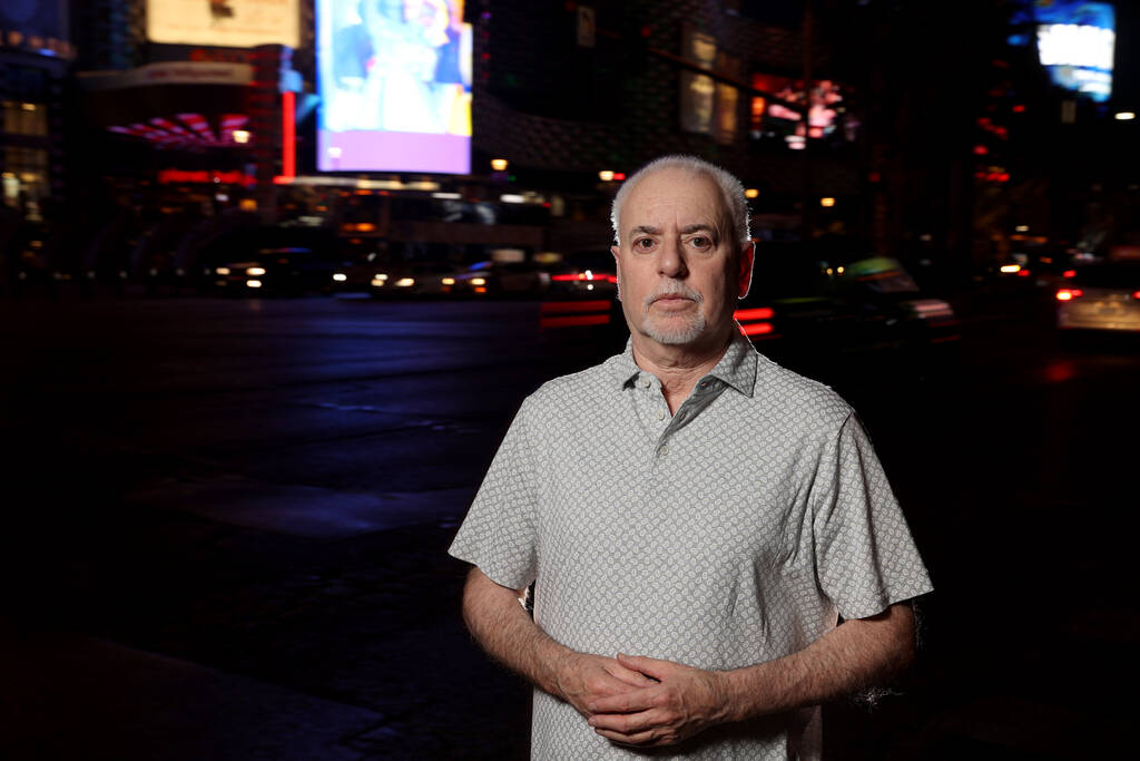 Review-Journal investigative reporter Jeff German poses on the Strip in Las Vegas on June 2, 20 ...