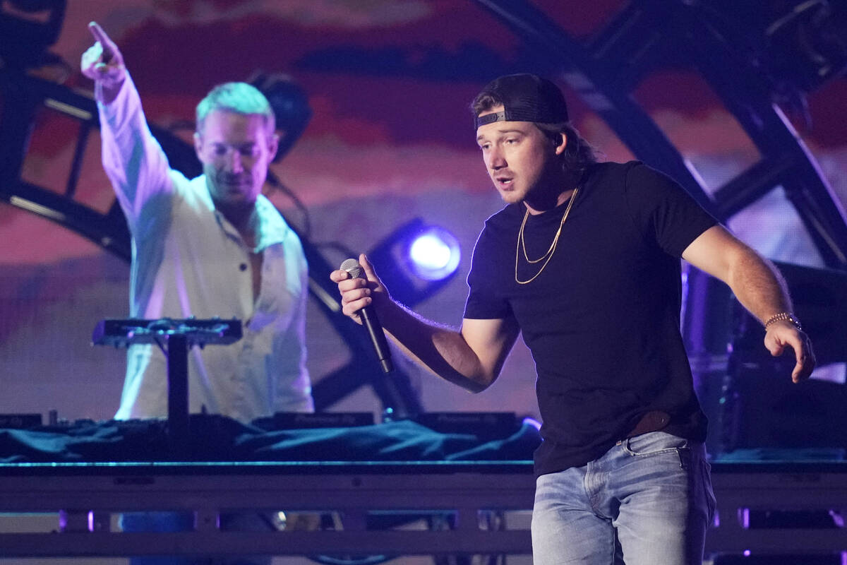 Morgan Wallen, right, performs with Diplo on the first night of the 2022 iHeartRadio Music Fest ...