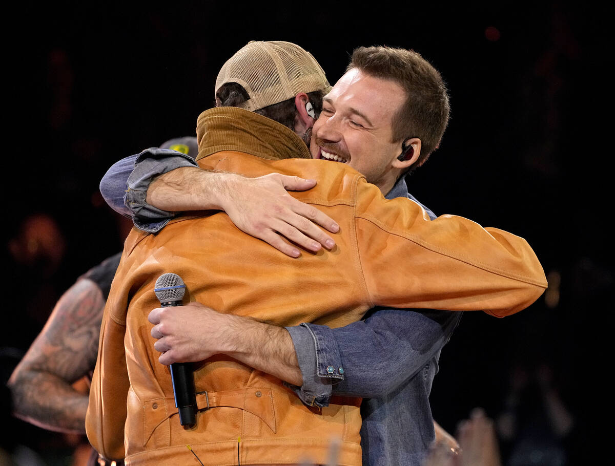 Post Malone, left, and Morgan Wallen perform a medley at the 57th Annual CMA Awards on Wednesda ...