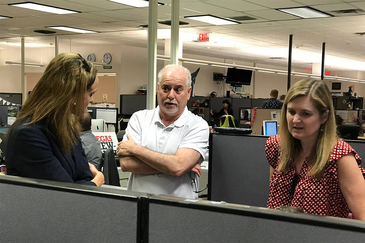 From left, Karisa King, Jeff German and Carri Geer Thevenot confer in the Review-Journal newsro ...