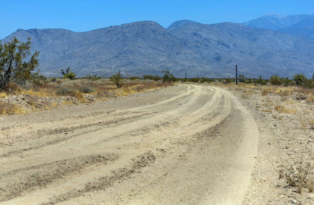 An existing dirt road winds its way out to the new Spaceport property on Saturday, July 27, 202 ...