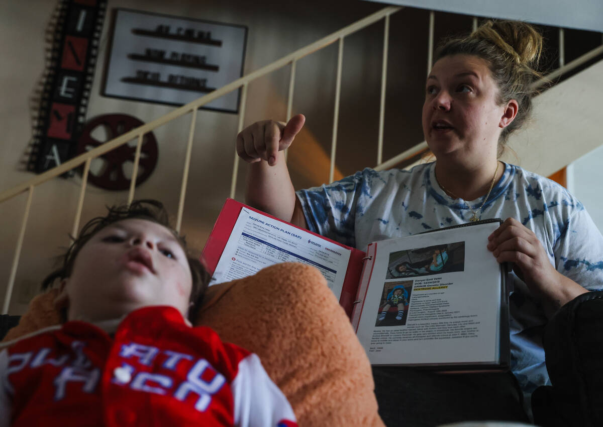 Heidi Tunea speaks about her family’s medical care obstacles next to her son Danyel Velez, 5, ...