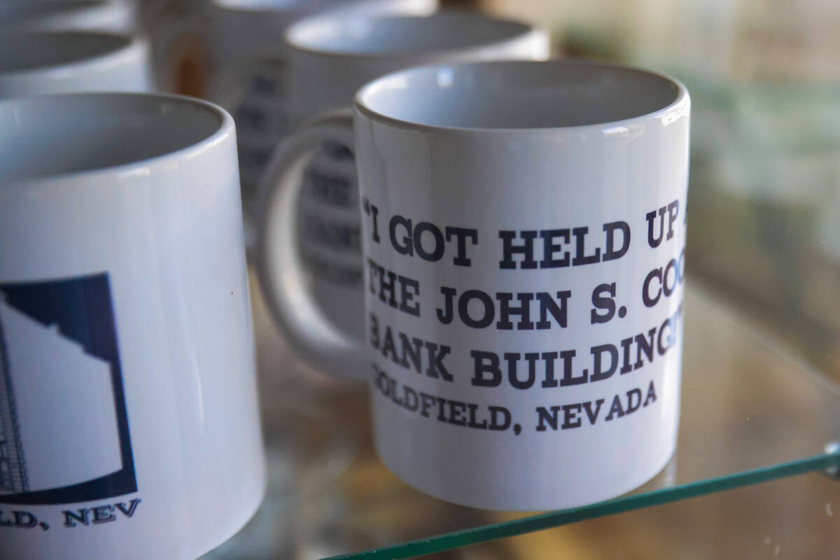 A mug for sale inside of the John S. Cook bank is seen during Goldfield Days on Saturday, Aug. ...