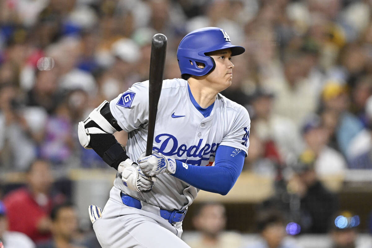 Los Angeles Dodgers designated hitter Shohei Ohtani (17) lines out during the eighth inning of ...