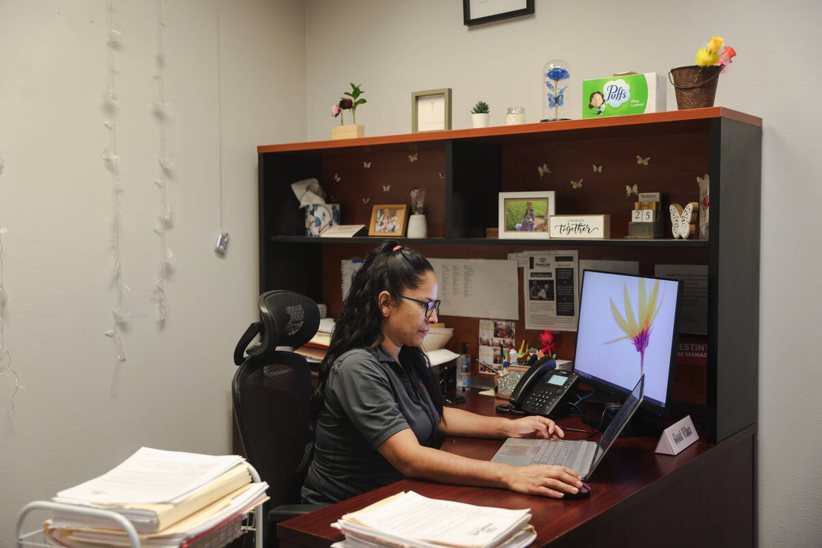 Paulina Garcia, case manager for senior services, works at her office at the HopeLink offices i ...