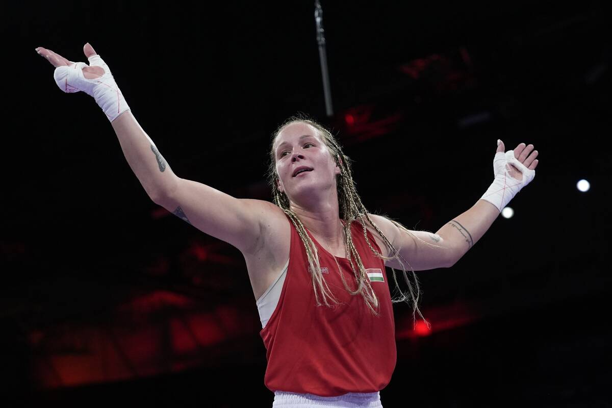 Hungary's Anna Hamori, celebrates after defeated Australia's Marissa Williamson in their women' ...