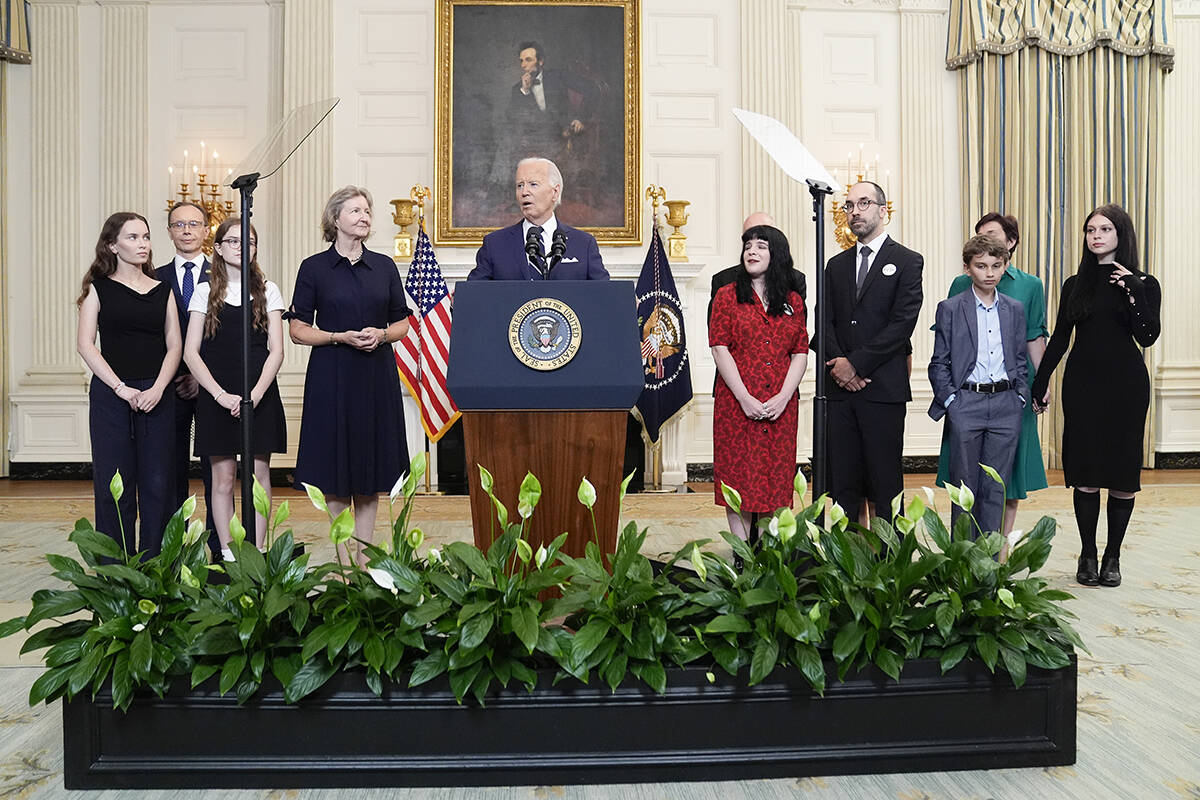 President Joe Biden, center, delivers remarks on a prisoner swap with Russia from the State Din ...