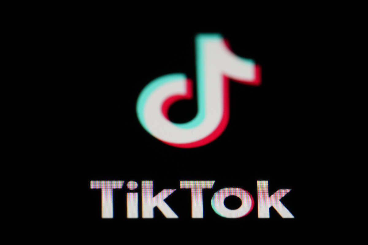 FILE - The icon for the video sharing TikTok app is seen on a smartphone, Feb. 28, 2023, in Mar ...