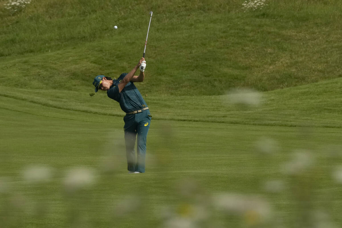 Min Woo Lee, of Australia,plays a shot from the 3rd fairway during the third round of the men's ...