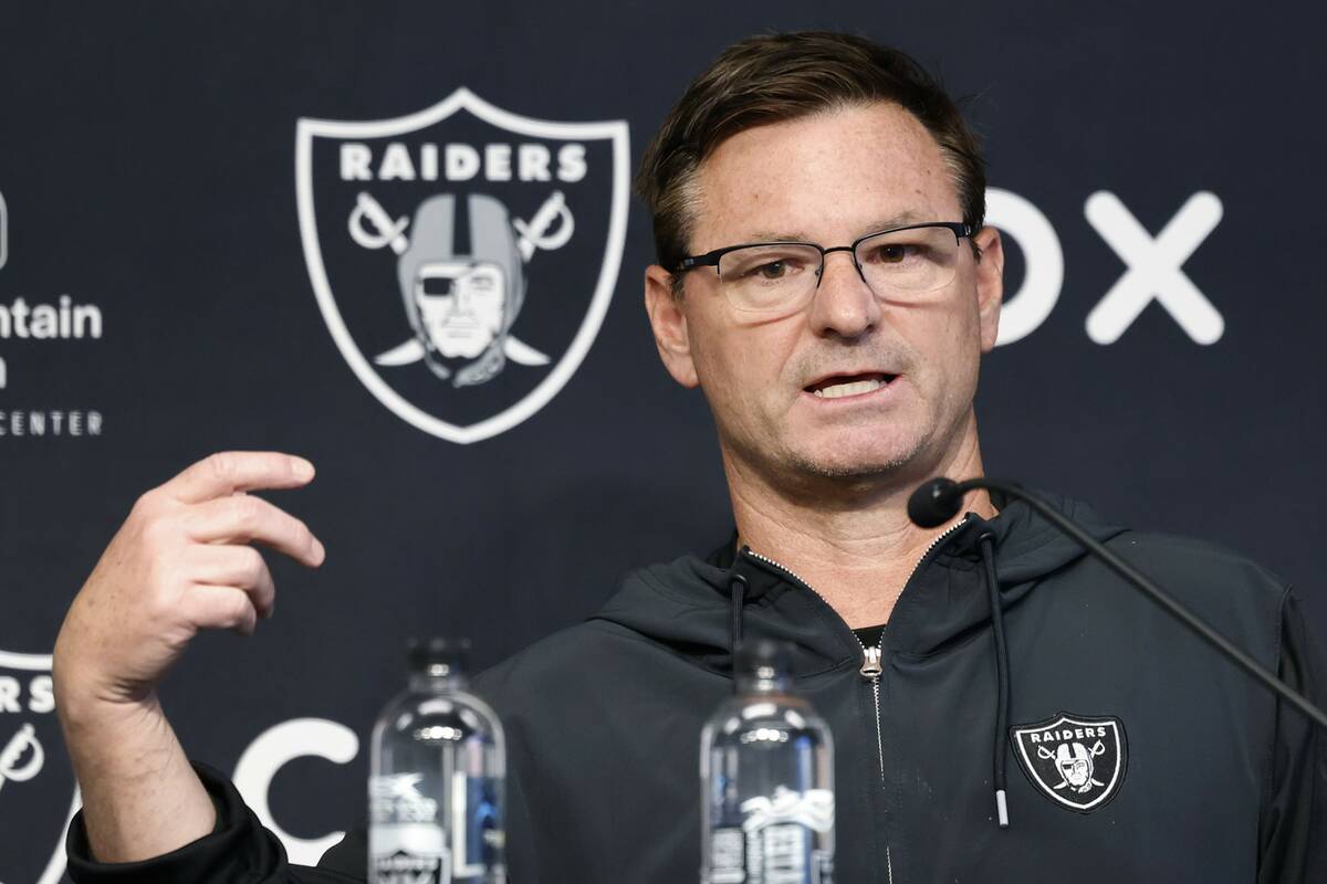 Raiders quarterbacks coach Rich Scangarello pauses as he addresses the media before team's prac ...