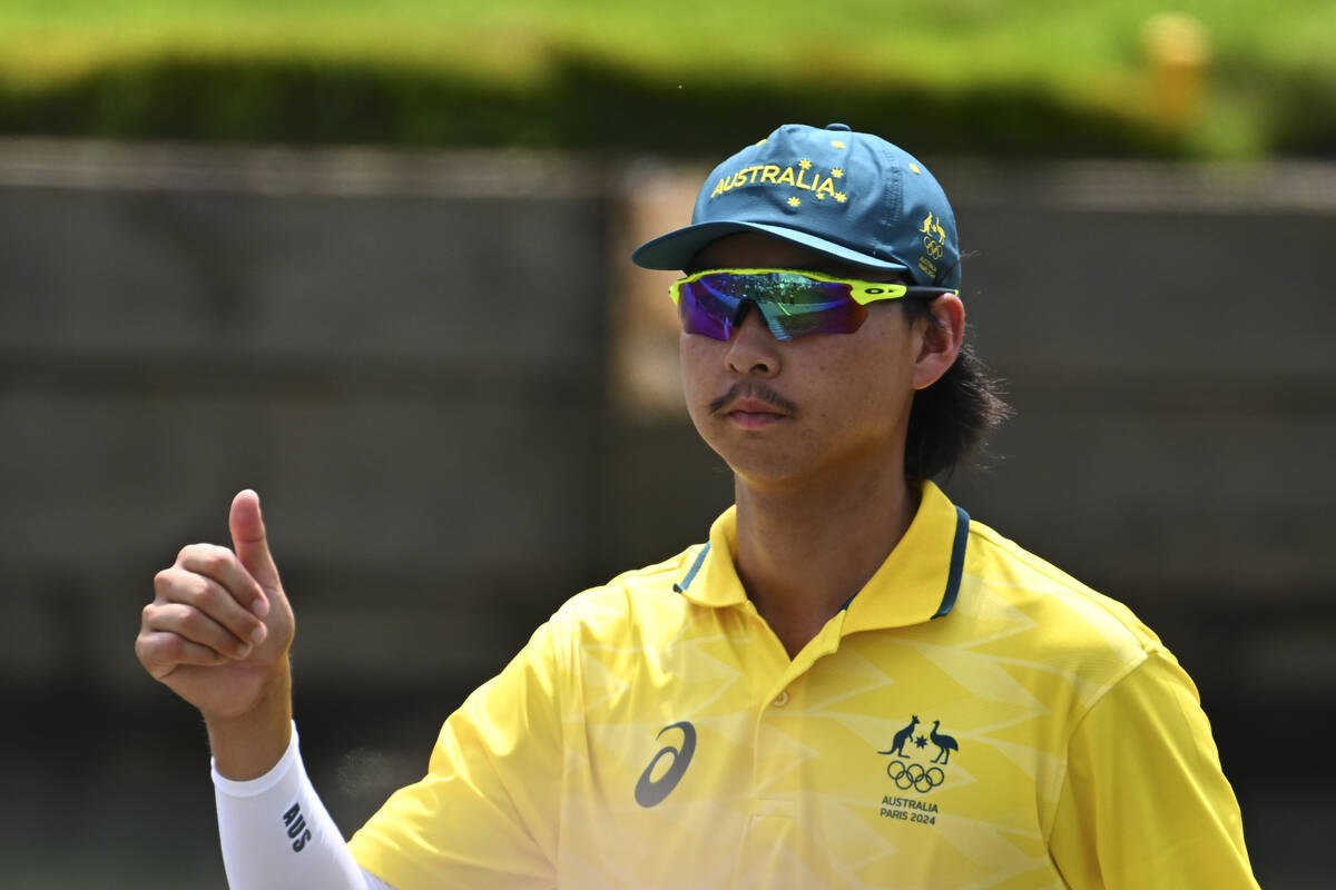 Min Woo Lee of Team Australia gives a thumbs up after the first round of the 2024 Paris Olympi ...