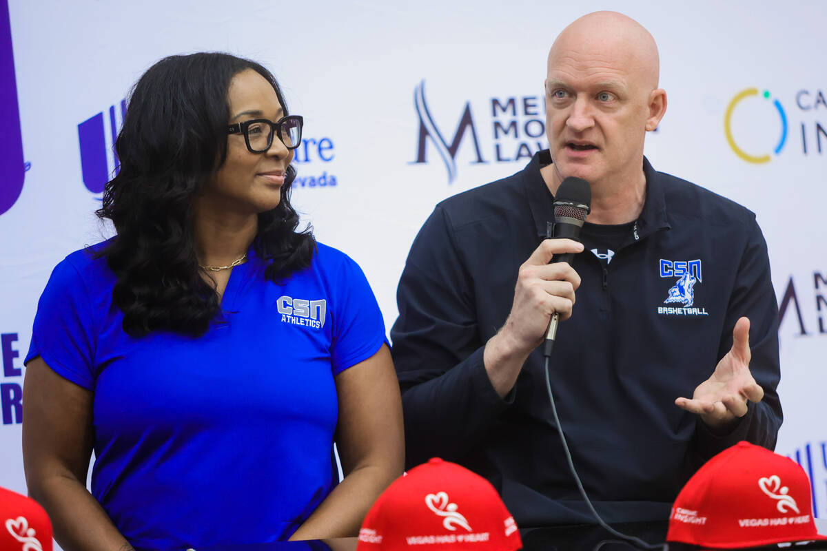 Dan Savage, head women’s basketball coach at the College of Southern Nevada, right, spea ...