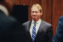 Jon Gruden leaves court after appearing at a hearing for oral arguments in a legal fight betwee ...