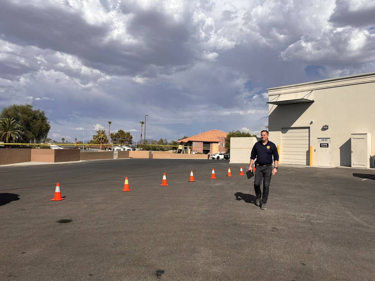 Metro Homicide Lieutenant Jason Johansson gives a briefing on a shooting that left a woman dead ...