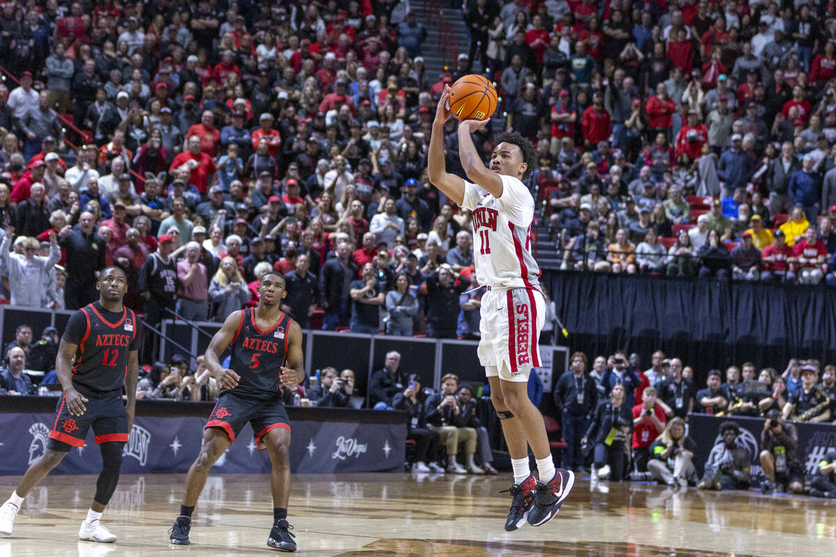 UNLV Rebels guard Dedan Thomas Jr. (11) shoots for the win but misses against the San Diego Sta ...