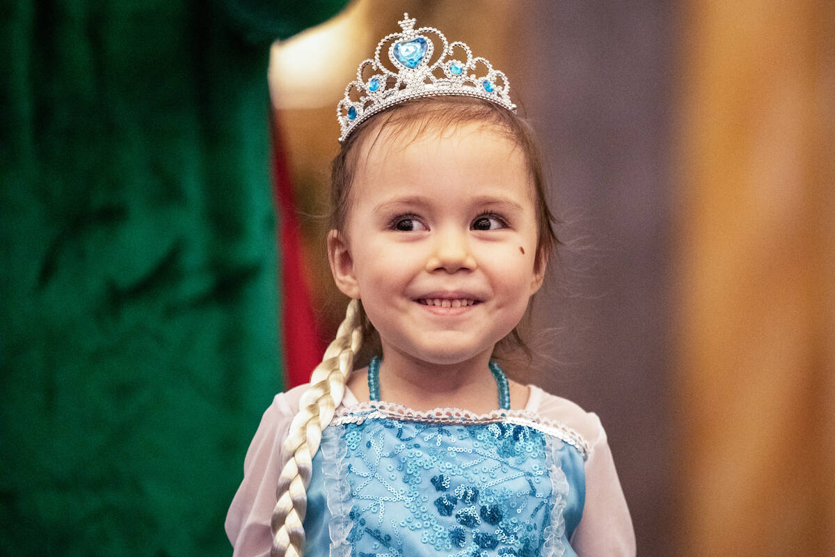 Samantha Buckley, 5, comes out dressed as a princess during a Make-A-Wish Southern Nevada trip ...