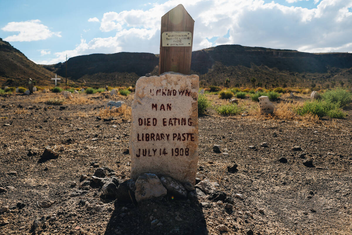 A grave for an unknown man who died after eating library paste is seen in the Goldfield Cemeter ...