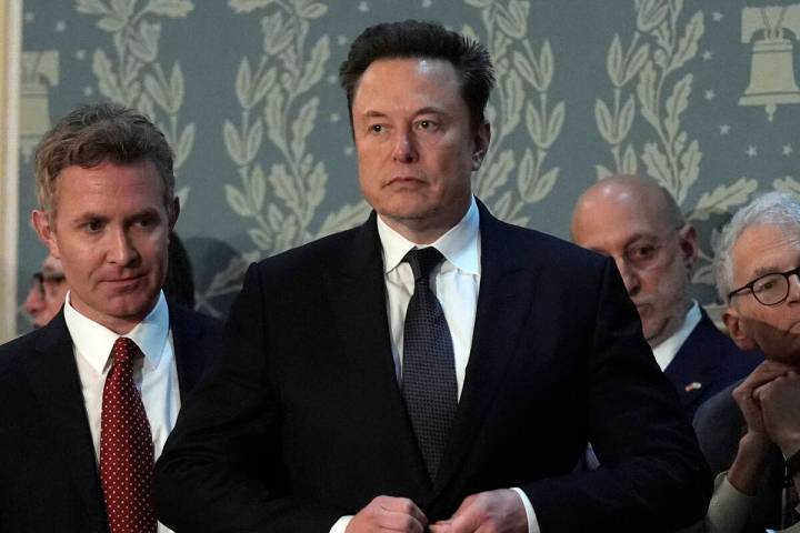 FILE - Elon Musk arrives before a joint meeting of Congress at the Capitol in Washington, July ...