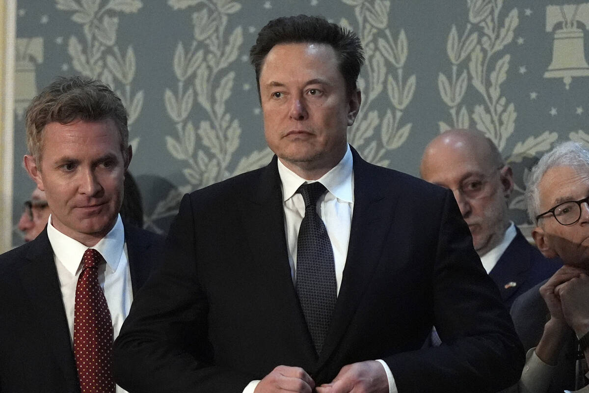 FILE - Elon Musk arrives before a joint meeting of Congress at the Capitol in Washington, July ...