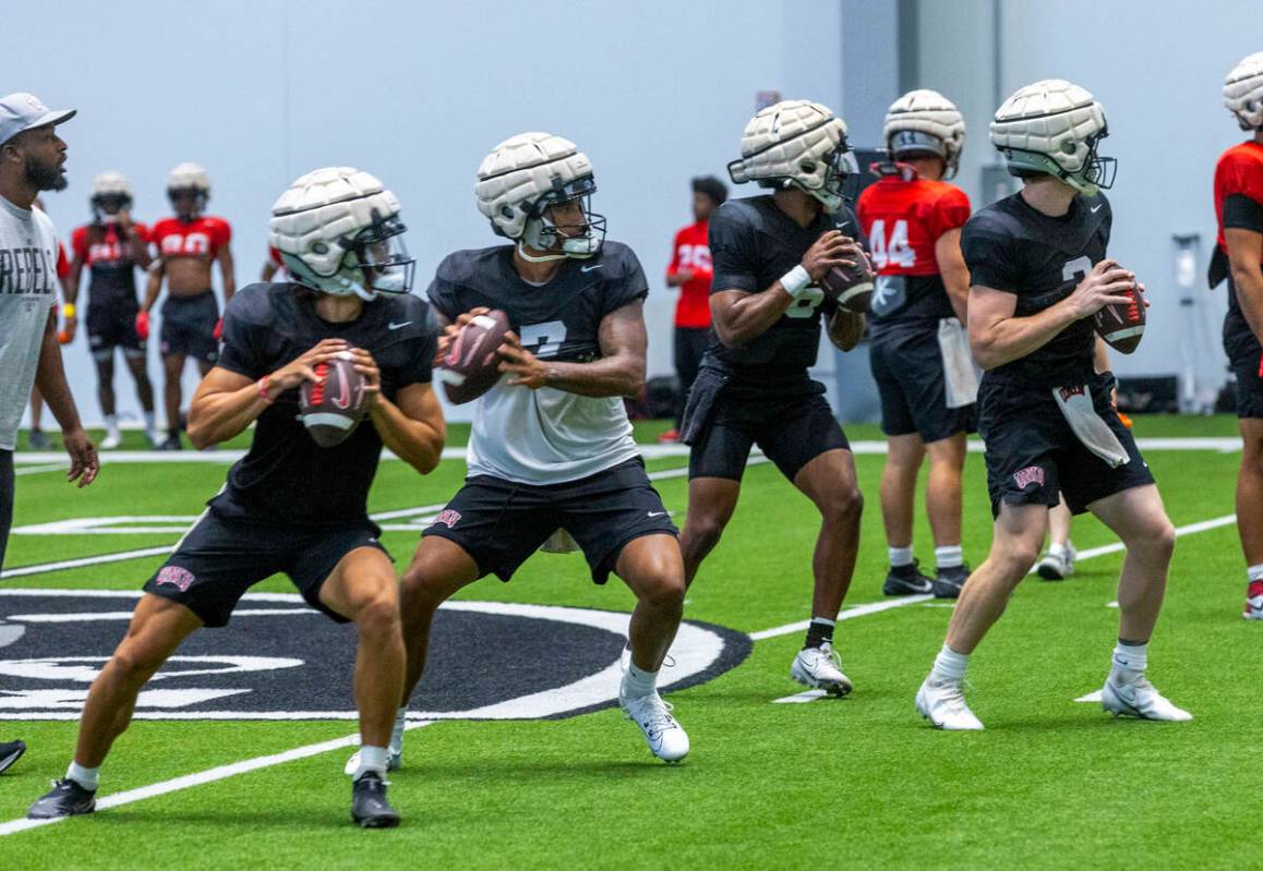 (LtoR) UNLV quarterbacksGael Ochoa (14), Cameron Friel (7), Hajj-Malik Williams (6) and Matthew ...