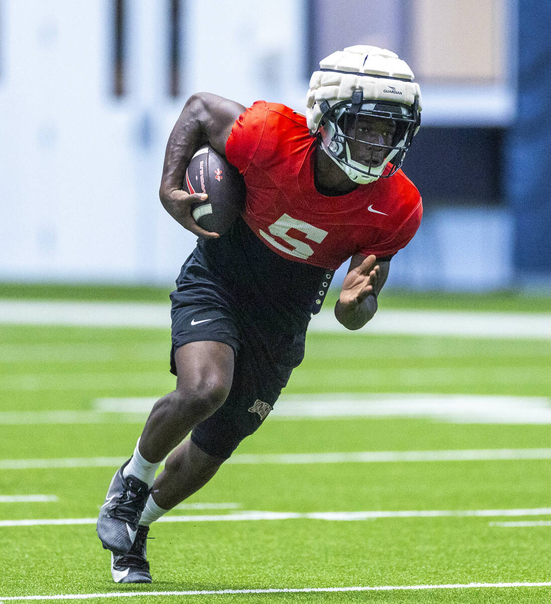 UNLV running back Greg Burrell (5) runs up the field during football practice at the Intermount ...