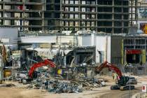 Machinery rips down some of the lower structures as the deconstruction of the Tropicana continu ...