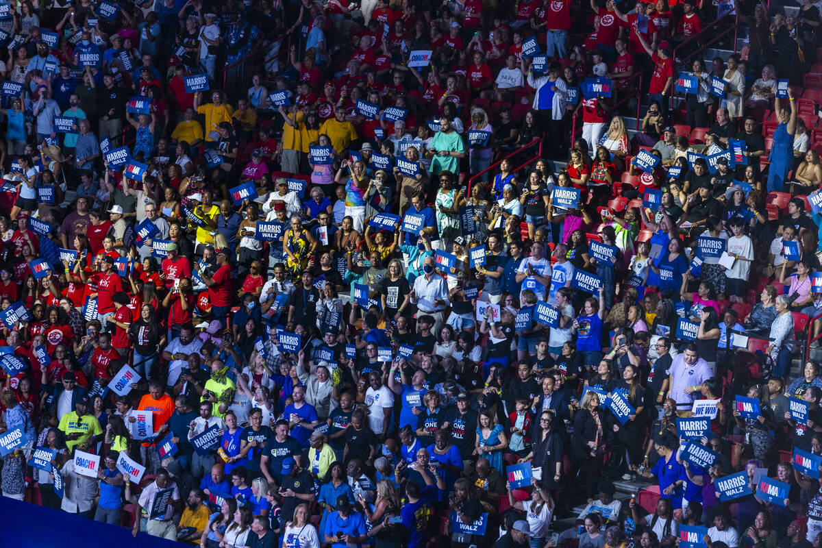 The crowd gets pumped up while dancing to music by DJ D-Nice as Vice President Kamala Harris an ...