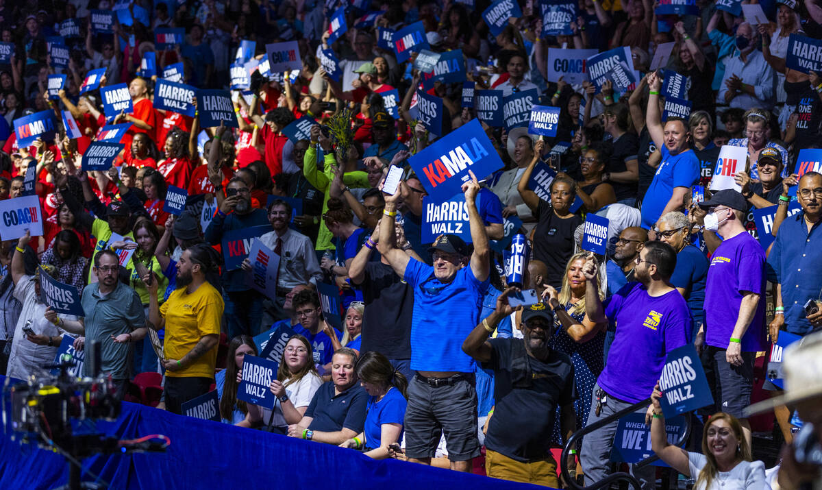 The crowd gets pumped up while dancing to music by DJ D-Nice as Vice President Kamala Harris an ...