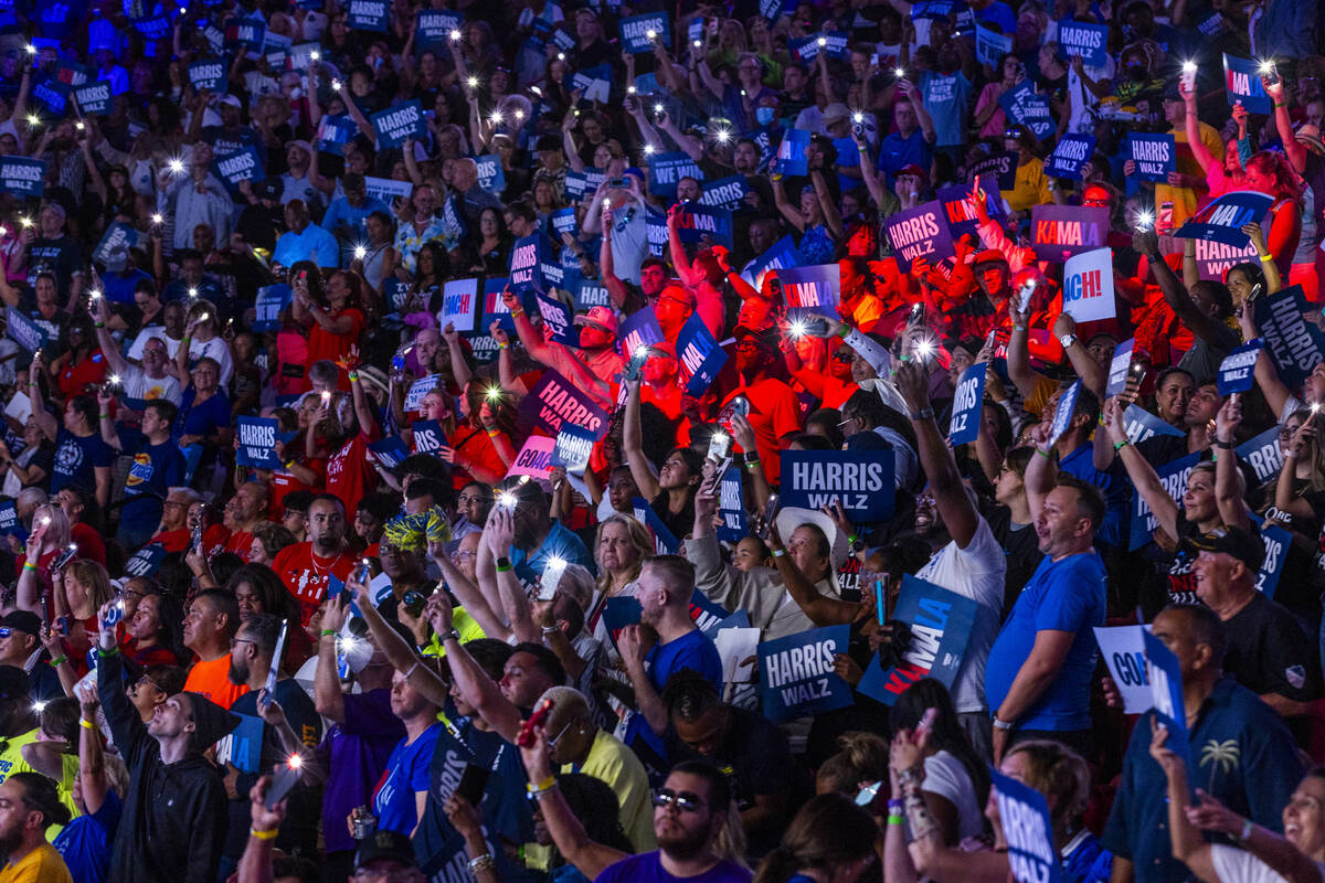 The crowd gets pumped up while dancing to music by DJ D-Nice as Vice President Kamala Harris an ...