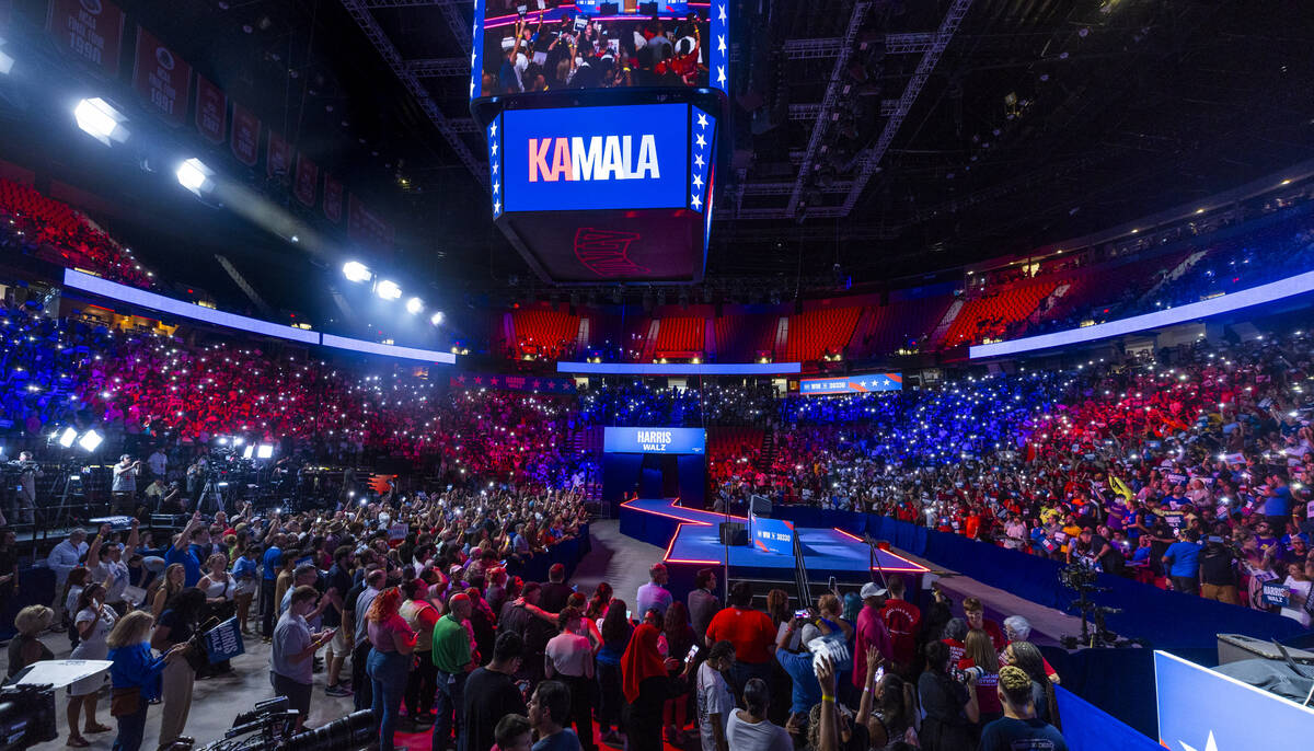 The crowd gets pumped up while dancing to music by DJ D-Nice as Vice President Kamala Harris an ...