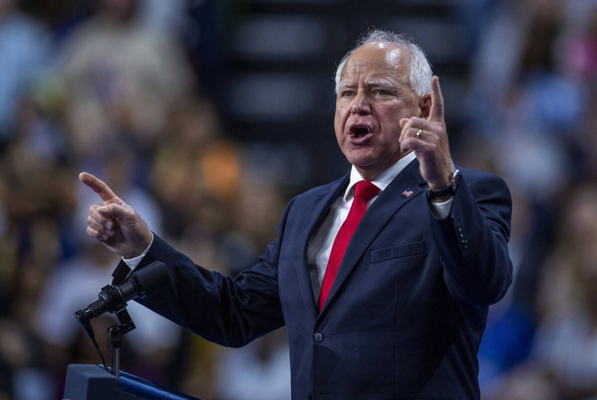 Minnesota Gov. Tim Walz speaks on stage as he and Vice President Kamala Harris hold a campaign ...