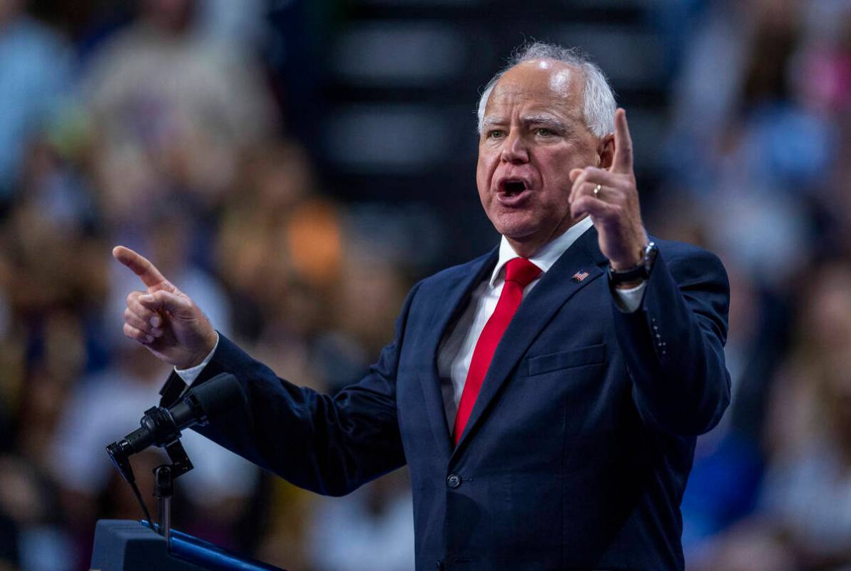 Minnesota Gov. Tim Walz speaks on stage as he and Vice President Kamala Harris hold a campaign ...