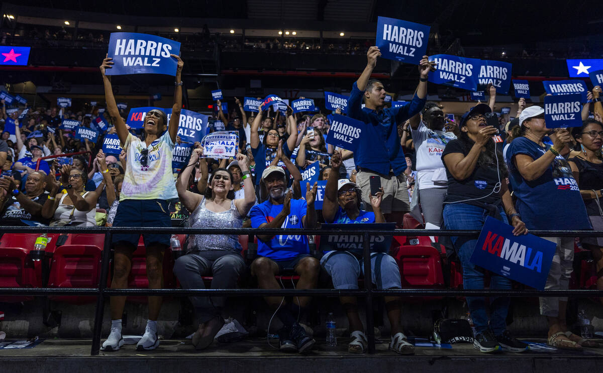 Supporters cheer as Vice President Kamala Harris speaks during a campaign rally at UNLV’ ...