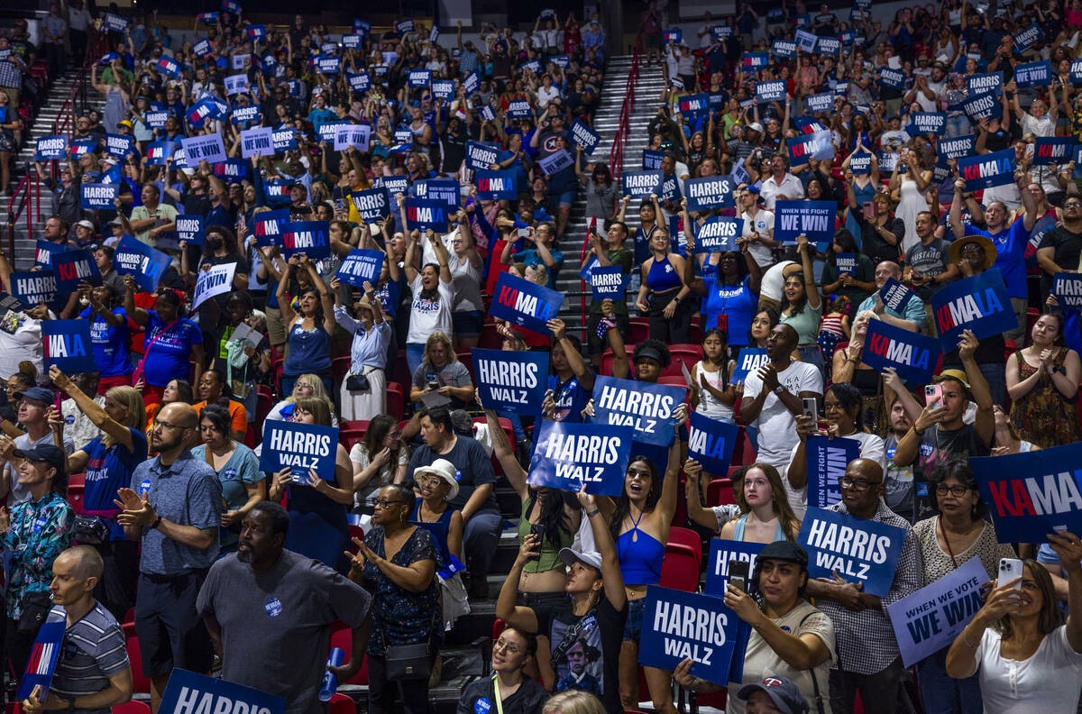 Vice President Kamala Harris and her running mate, Minnesota Gov. Tim Walz, hold a campaign ral ...