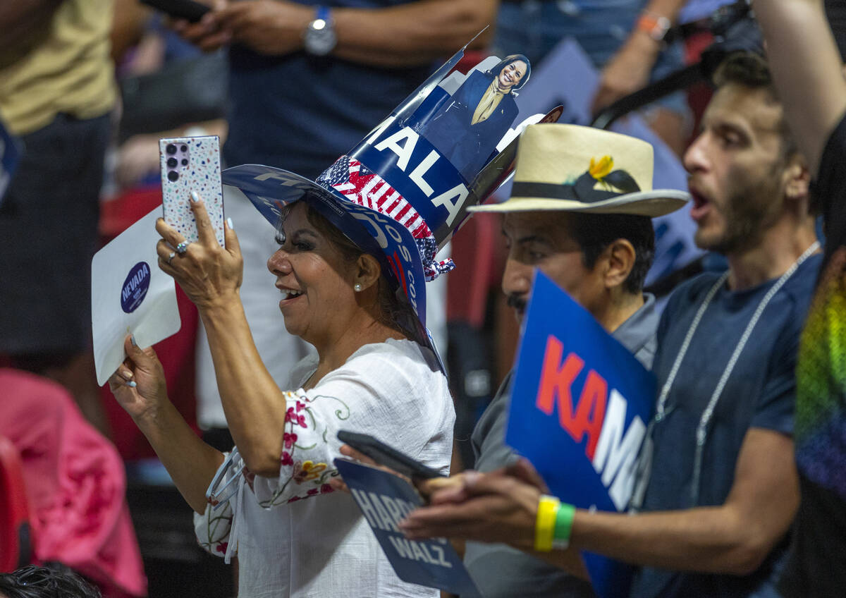 Supporters cheer as Vice President Kamala Harris speaks during a campaign rally at UNLV’ ...