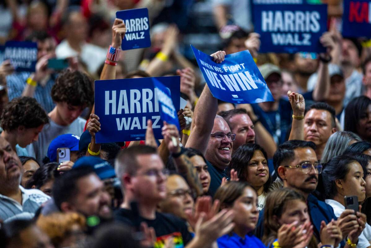 Supporters cheer as Vice President Kamala Harris speaks during a campaign rally at UNLV’ ...