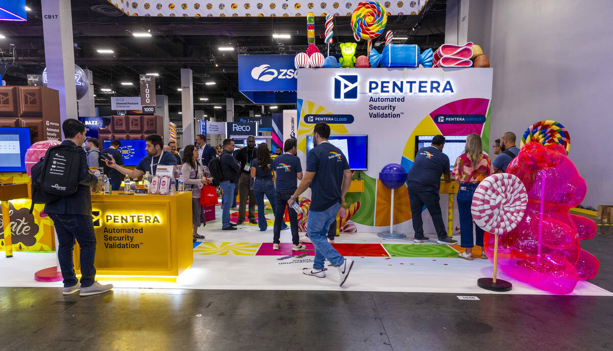 The Pentera display is set in the like of Candyland as attendees wander about during the Black ...