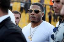 Rapper Nelly approaches the stage for a concert in Erbil, northern Iraq, March 13, 2015. (AP Ph ...