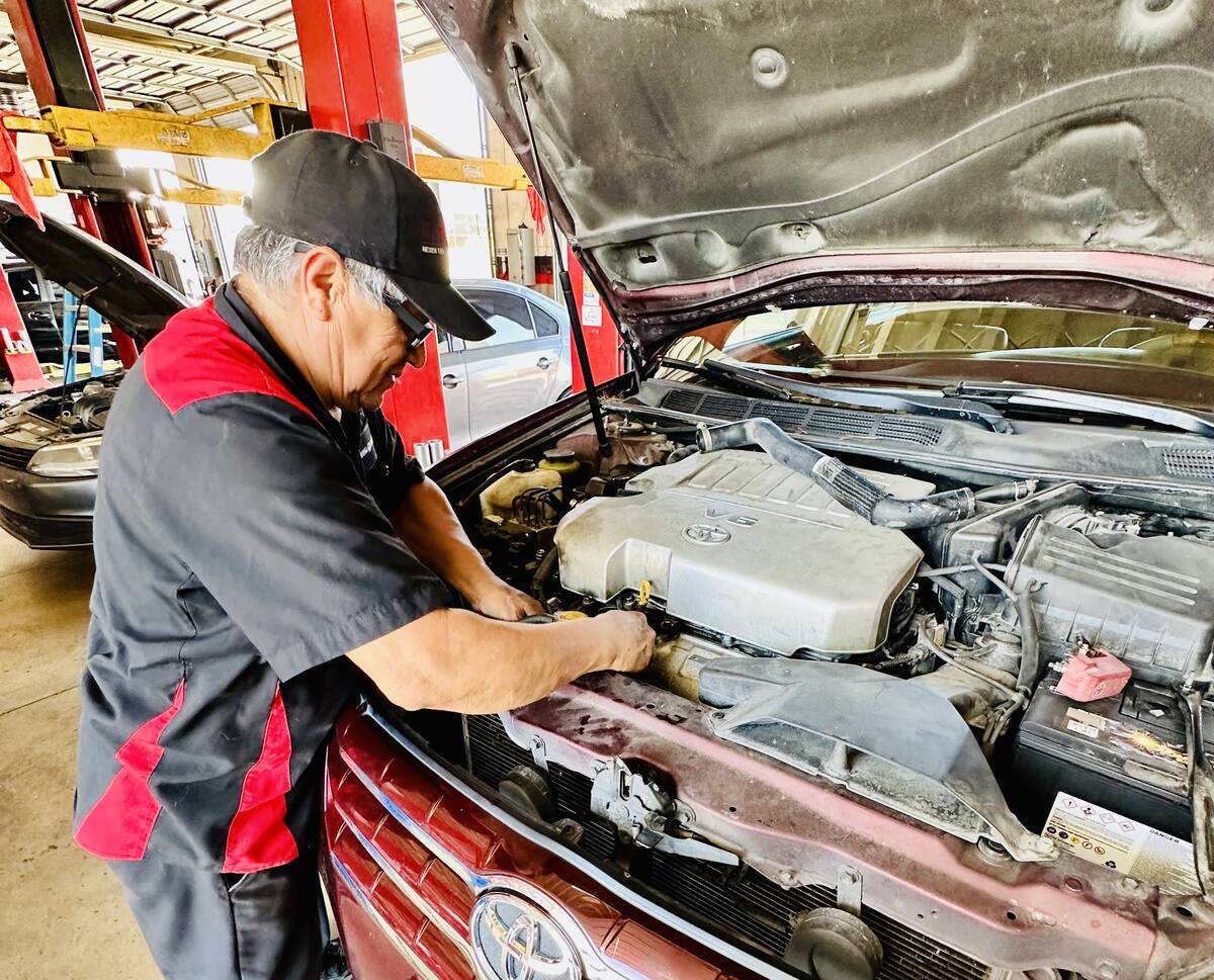 Big O Tires offers services including checking fluids as shown by Pedro Miranda.