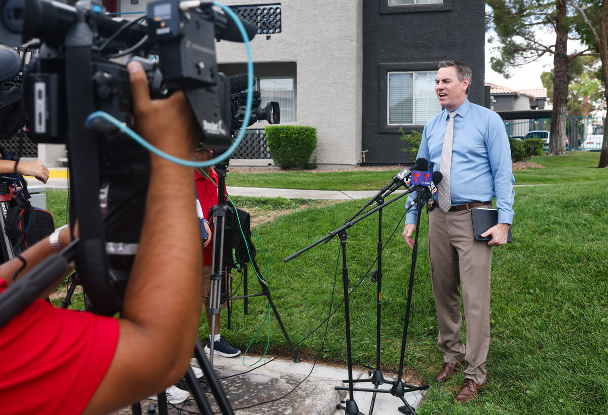 Metro Homicide Lt. Jason Johansson addresses media during a press conference regarding a shooti ...