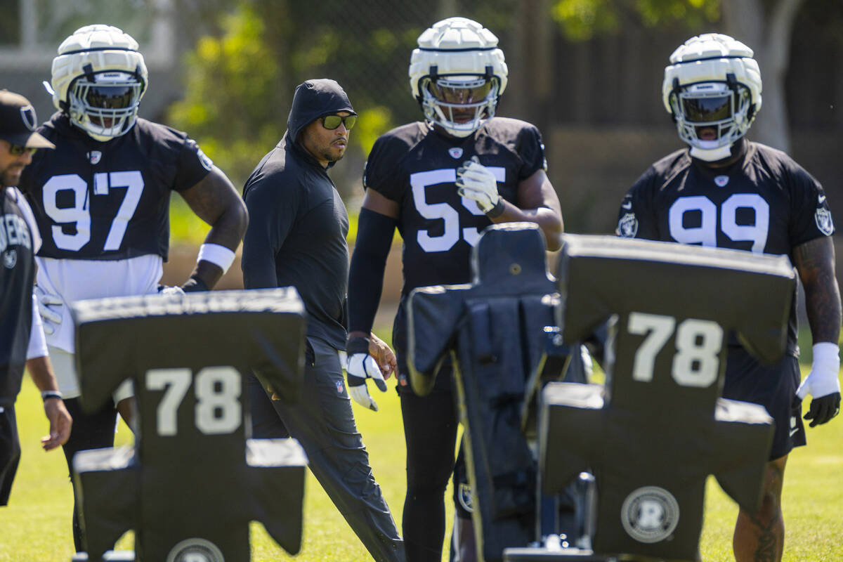 Raiders head coach Antonio Pierce watches his defense run drills during the third day of Raider ...