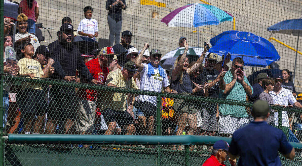 Nevada fans cheer for their team after a 2-0 win over Utah in the Mountain Regional final baseb ...