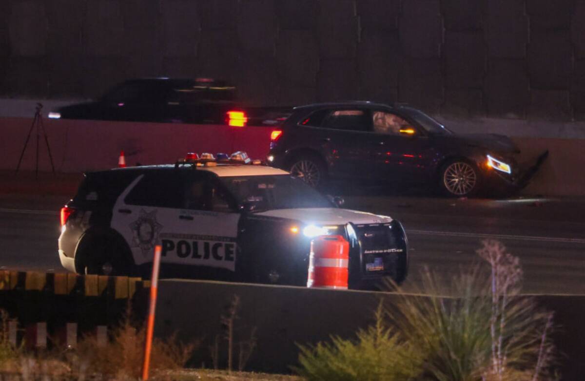 Police investigate a shooting on Interstate 15 southbound on Thursday, Aug. 8, 2024, in Las Veg ...