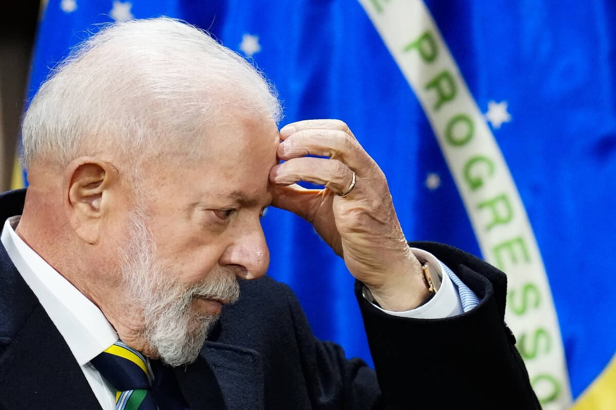 Brazil's President Luiz Inacio Lula da Silva gestures during a ceremony with Chilean President ...