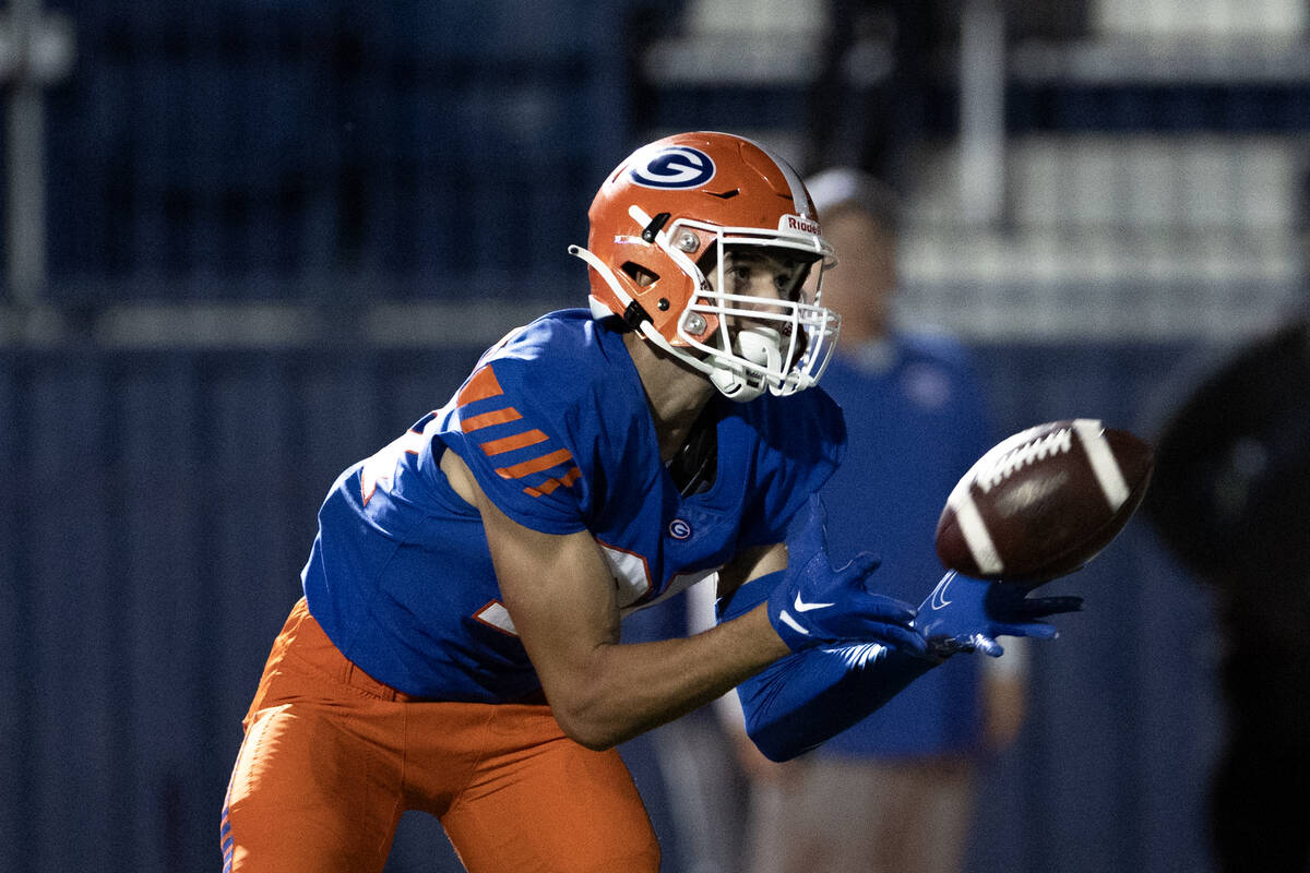 Bishop Gorman wide receiver Derek Meadows (30) catches the ball before running in a touchdown d ...